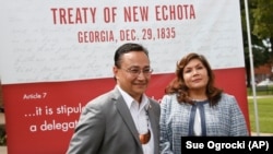 FILE - Cherokee Nation Principal Chief Chuck Hoskin Jr. and delegate designate Kimberly Teehee , Tahlequah, Okla., Thursday, Aug. 22, 2019.