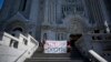 Demonstrators from the Batchewana First Nation demonstrate outside the mass presided over by Pope Francis, Thursday, July 28, 2022, in Quebec.