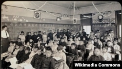 First- and second-grade students at the Genoa Indian School appeared anxious in a photo taken in 1910.