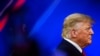 FILE - Former US President Donald Trump arrives to speak at the Conservative Political Action Conference 2022 (CPAC) in Orlando, Florida, Feb. 26, 2022.