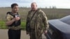 One of the two injured journalists, Idrak Jamalbeyli, who reports for VOA’s Azerbaijani Service, interviews a Ukrainian soldier. 