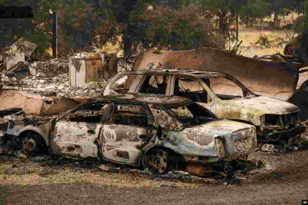 The charred vehicles by the Apache Fire sit parked in Palermo, California, Jun. 25, 2024.