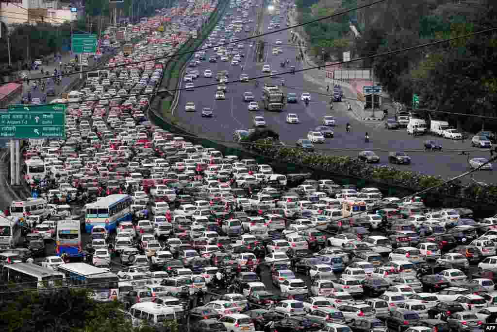 Vehicles are seen stuck in bumper to bumper traffic on the Delhi-Jaipur expressway in Gurgaon, India.