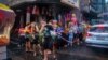 Locals celebrate the Sonkran water festival in Bangkok, Thailand, April 13, 2024.