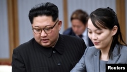 資料照：北韓領導人金正恩和他的妹妹金與正