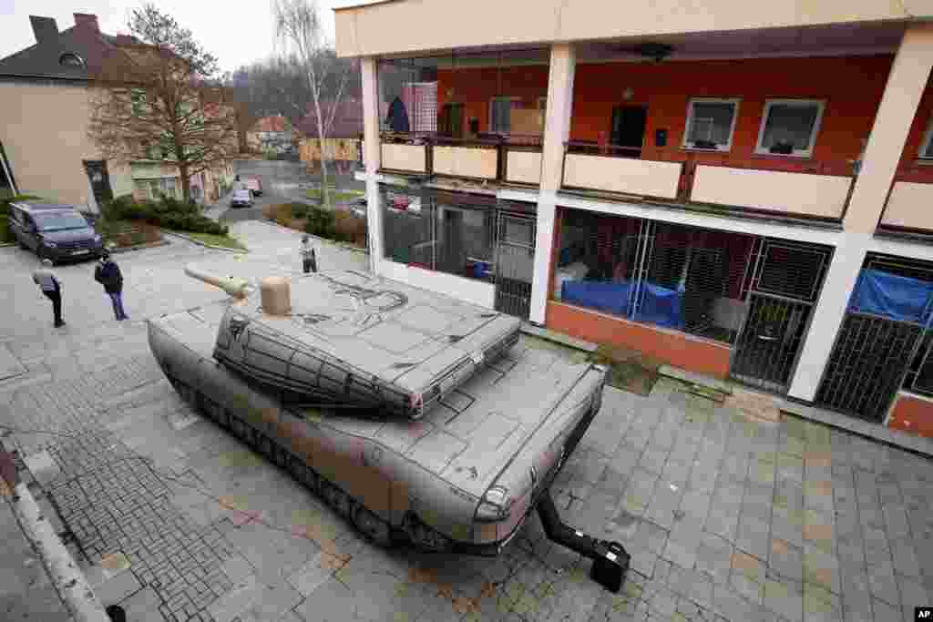 An inflatable decoy of an Abrams tank is presented to media in Decin, Czech Republic. Czech company, Inflatech, has made a wide range of replicas of heavy arms, armored vehicles, aircraft or artillery, including U.S.-made HIMARS rocket system, the weapons that were among the billions of dollars in Western military aid that has helped Ukraine fight off the Russians since the Feb. 24 invasion. 