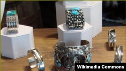 Legitimate Navajo sterling silver and turquoise jewelry is seen on display in a Santa Fe art studio.