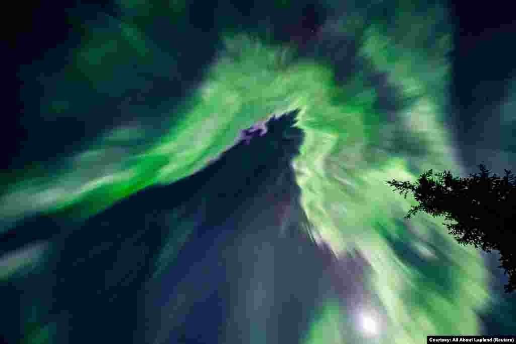 View of northern lights illuminating the sky, in Tepasto, Finland, March 5, 2023.