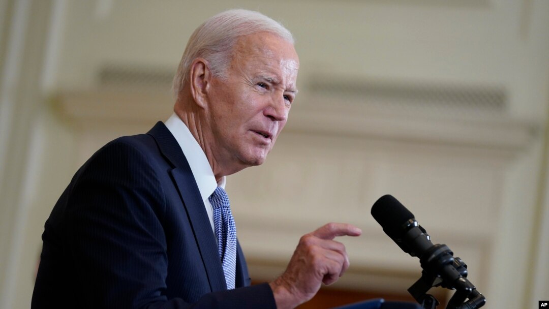 FILE - President Joe Biden speaks on the anniversary of the Inflation Reduction Act during an event in the East Room of the White House, Aug. 16, 2023, in Washington. 