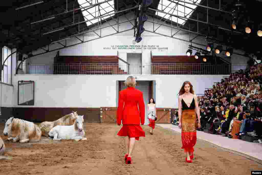 Models present creations by designer Stella McCartney as part of her Fall-Winter 2023/2024 Women's ready-to-wear collection show during Paris Fashion Week in Paris, France.
