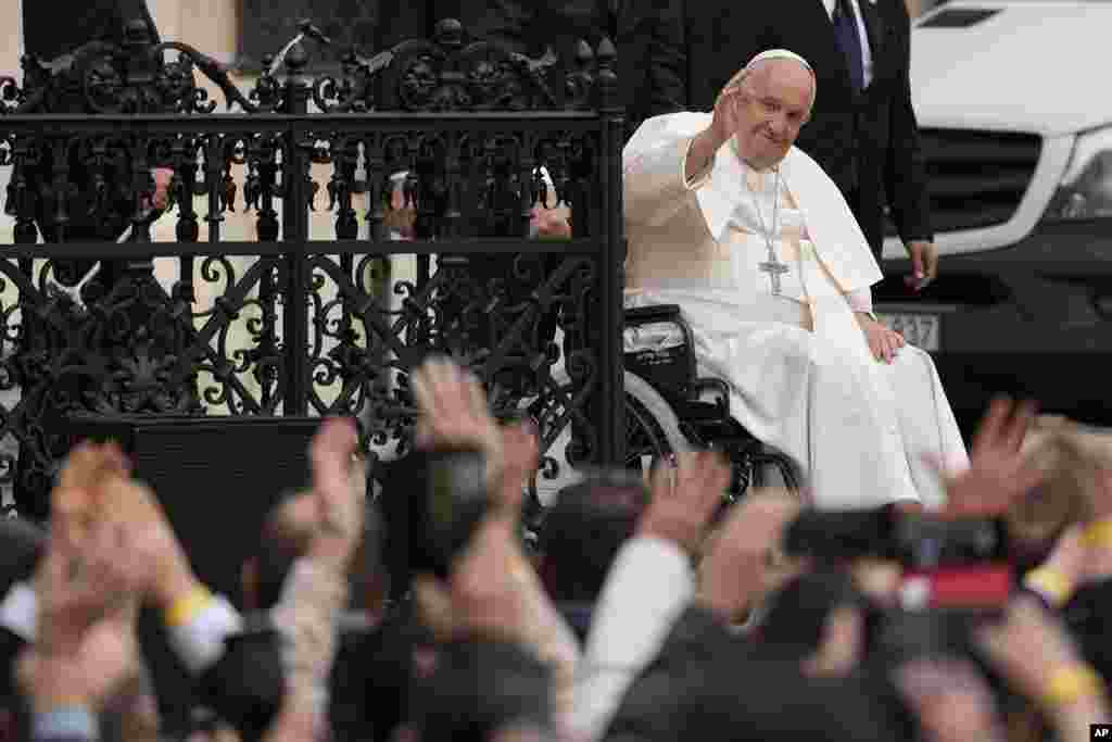 Pope Francis arrives for a meeting with bishops, priests, deacons, consecrated persons, seminarians and pastoral workers in St. Stephen's Co-Cathedral in Budapest, Hungary.