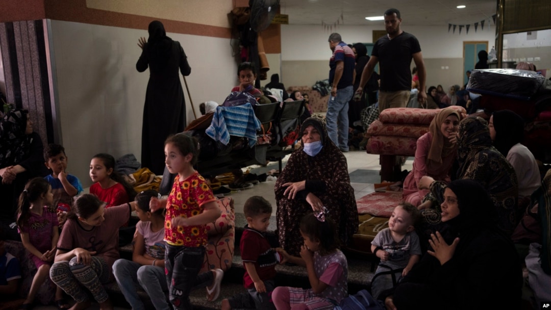 Palestinians take shelter in the Nasser hospital during Israeli bombardment in Khan Younis, Gaza Strip, Oct. 27, 2023.