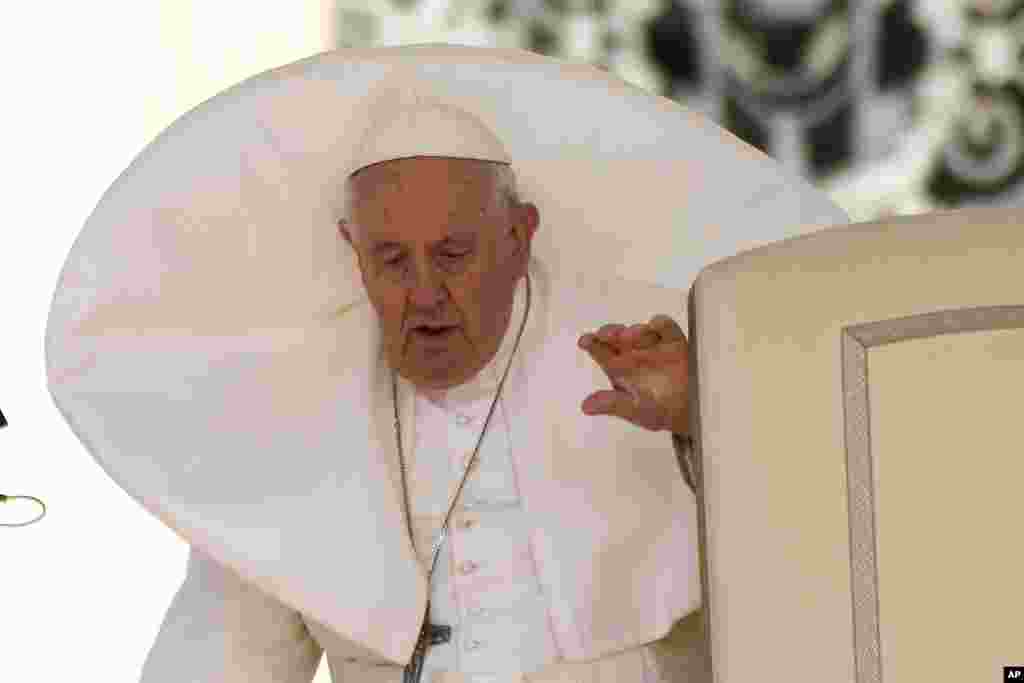 Pope Francis arrives for his weekly general audience in St. Peter's Square at The Vatican.