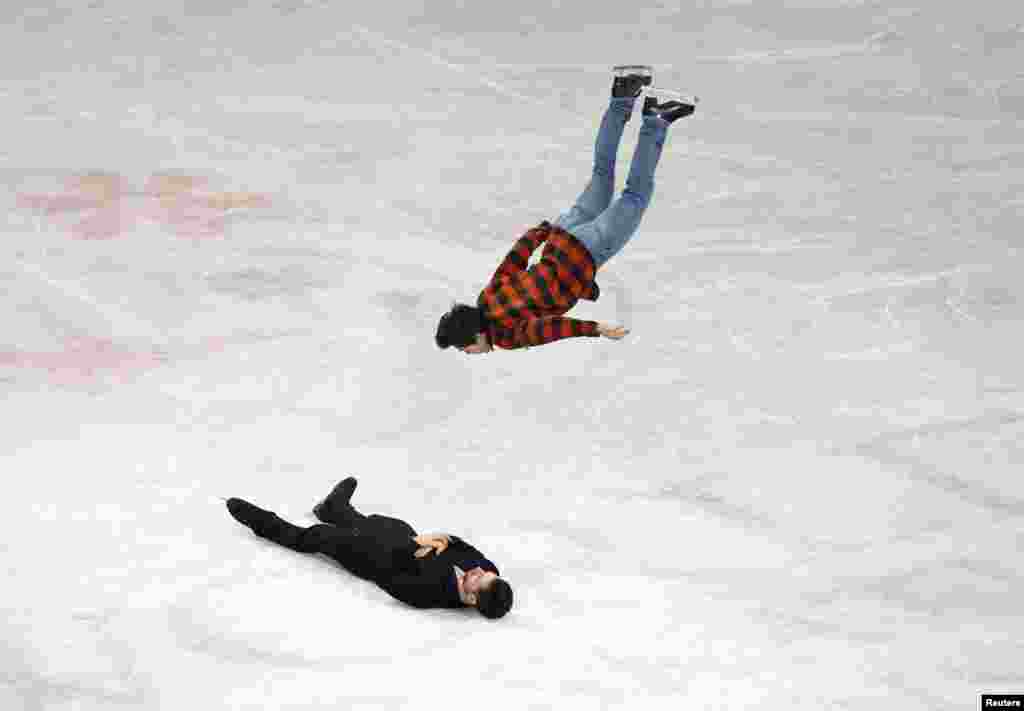Canada's Keegan Messing backflips over Canada's Maxime Deschamps after the Gala Exhibition at the ISU World Figure Skating Championships 2023 in Saitama , Japan.