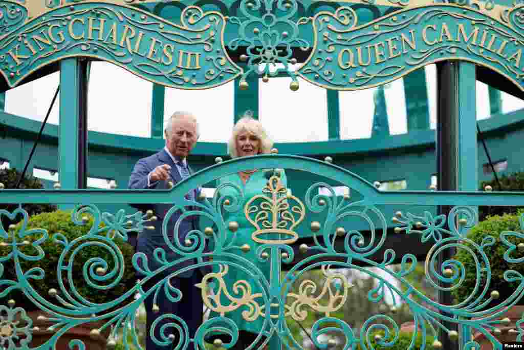 Britain's King Charles and Queen Camilla attend the opening of the new Coronation Garden in Newtownabbey, Northern Ireland.