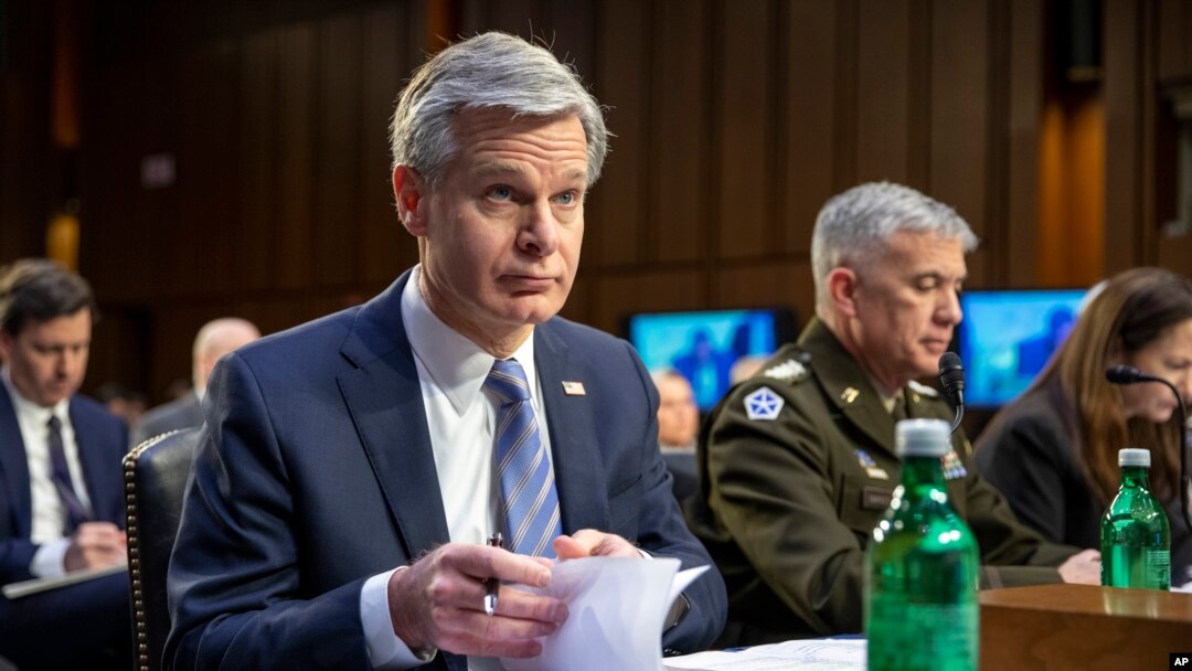 FBI director Christopher Wray looks through his notes before a Senate Intelligence Committee hearing to examine worldwide threats on Capitol Hill in Washington, March 8, 2023. 