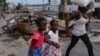 Haitians demand resignation, arrest of country's police chief after gang attack 