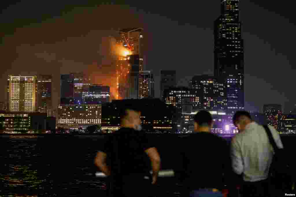 A building is seen on fire in Hong Kong, China.