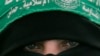 FILE - A Palestinian Hamas supporter attends a protest against Israel's attacks on the Gaza Strip, in Gaza City, on March 3, 2008.