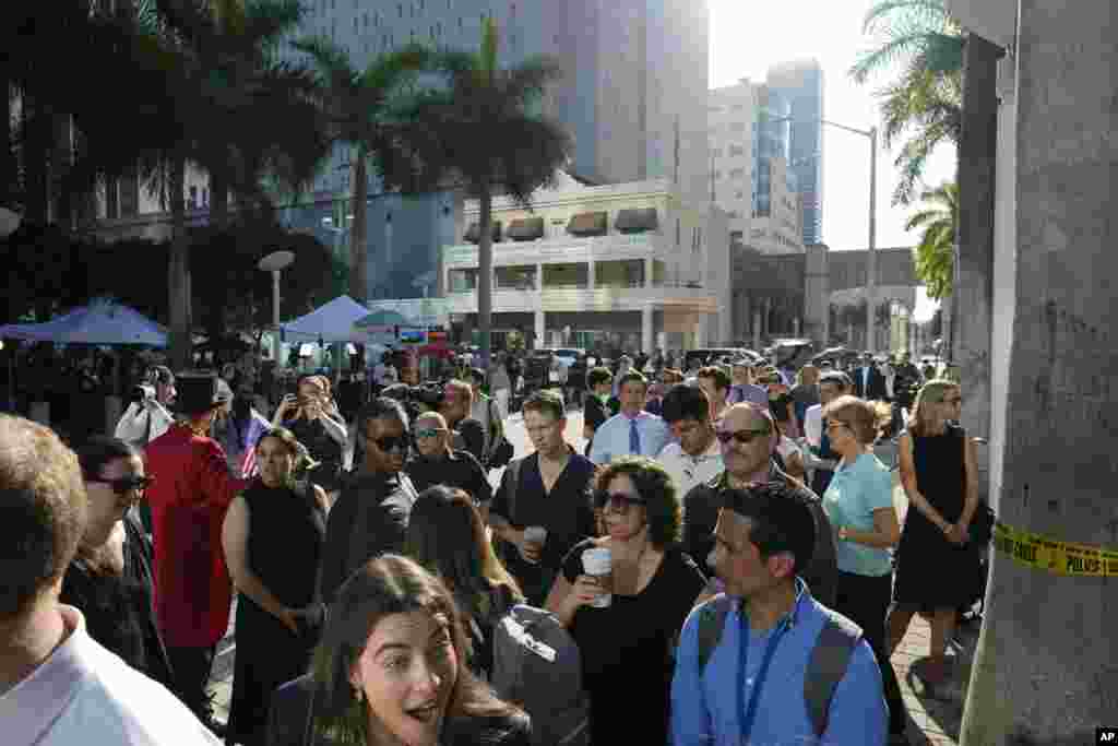 Journalists line up to be admitted inside the Wilkie D. Ferguson Jr. U.S. Courthouse in Miami, Florida. Former President Donald Trump is making a federal court appearance on dozens of felony charges accusing him of illegally hoarding classified documents and thwarting the Justice Department's efforts to get the records back. 