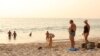 FILE - Russian tourists stay at the beach in Phuket, Thailand, March 12, 2022.