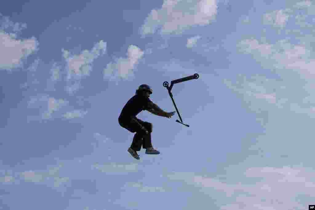A participant performs acrobatics during an international Urban Sports event in Madrid, Spain.
