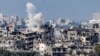 Esta fotografía tomada desde la ciudad de Sderot, en el sur de Israel, muestra una columna de humo en erupción durante el bombardeo israelí en el norte de la Franja de Gaza, el 19 de octubre de 2023.