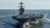 FILE - In this April 8, 2017 photo provided by the U.S. Navy, the USS Gerald R. Ford embarks on the first of its sea trials to test various state-of-the-art systems on its own power for the first time, from Newport News, Va.