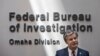 FILE - FBI Director Christopher Wray is pictured at the FBI office in Omaha, Nebraska, Aug. 10, 2022. Wray told lawmakers last month that the bureau's data showed searches for U.S. citizens or their information under FISA Section 702 had dropped 93% from 2021 to 2022. 