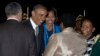 President Barack Obama and first lady Michelle Obama are greeted upon their arrival at Waterkloof Air Base in Centurion, South Africa, June 28, 2013,.