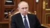 FILE - Russian President Vladimir Putin at a meeting in Moscow on Jan. 5, 2023. Putin announced this week he will suspend Russia's participation in the New START treaty, which limits the number of warheads deployed by Russia and the United States.