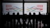 FILE - Travelers at Hong Kong International Airport after the lifting of COVID-19 movement controls in Hong Kong, China, Dec. 14, 2022.