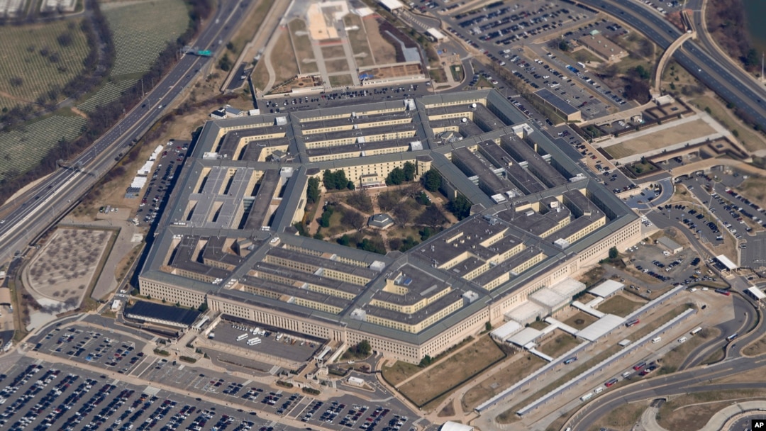 FILE - The Pentagon is seen from Air Force One as it flies over Washington, March 2, 2022. 