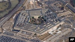 FILE - The Pentagon is seen from Air Force One as it flies over Washington, March 2, 2022. 
