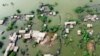 FILE - Rumah-rumah terendam banjir di kota Sohbat Pur, sebuah distrik di provinsi Baluchistan barat daya Pakistan, 30 Agustus 2022.(AP/Zahid Hussain, File)