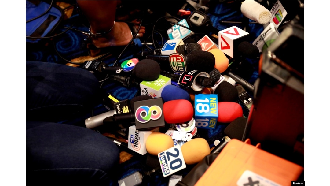 Media microphones are seen during a press conference led by the Palang Pracharat Party in Bangkok, Thailand June 4, 2019. REUTERS