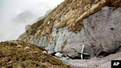 The wreckage of a plane lost in Nepal’s mountains was found scattered on a mountainside on May 30, 2022. Fishtail Air handed out this photograph.