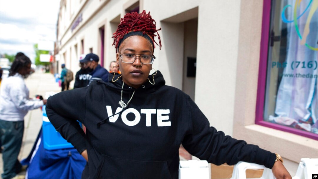 Jillian Hanesworth, with Open Buffalo, poses for a photo May 17, 2022, in Buffalo, NY. 'We see how Black and brown people get treated by the police,' she said, that police don't hesitate to 'take deadly action against Black and brown people.'