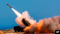German soldiers assigned to Surface Air and Missile Defense Wing 1, fire the Patriot weapons system at the NATO Missile Firing Installation, in Chania, Greece, on November 8, 2017. (Sebastian Apel/U.S. Department of Defense, via AP)