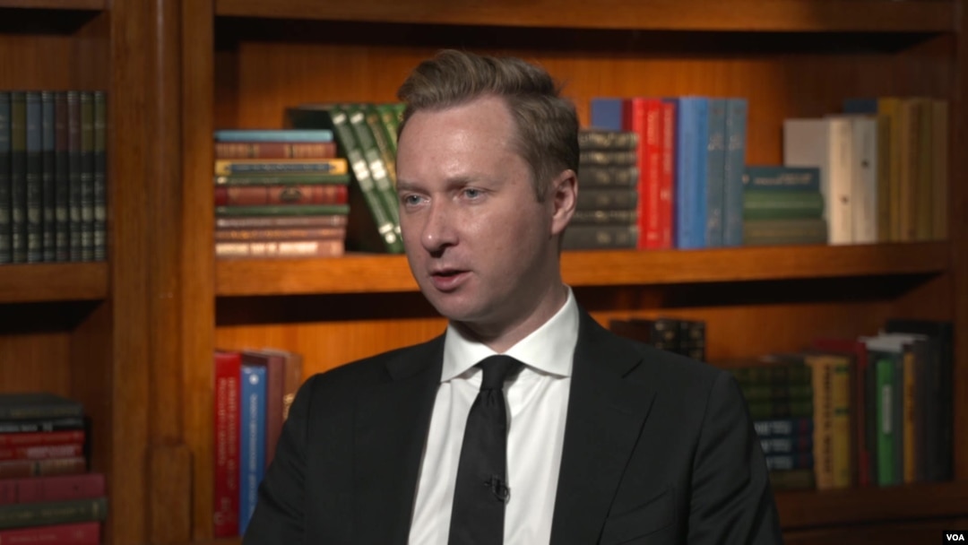Andrew Adams, director of the Justice Department's Task Force Kleptocapture, is seen in this screenshot from an interview with VOA in December 2022. 