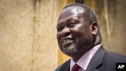 FILE - Sudan says South Sudanese opposition leader Riek Machar is in Khartoum, where he is being treated for a leg injury and is currently in "stable" condition.