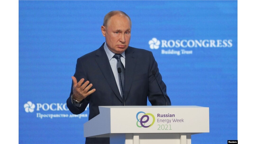Russian President Vladimir Putin delivers a speech during a plenary session of the Russian Energy Week International Forum in Moscow, Russia October 13, 2021. Sergei Ilnitsky/Pool via REUTERS