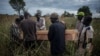 Pallbearers at the border of South Sudan and Uganda carry the casket containing the remains of Duku Evans, a civilian killed November 3 amid fighting between government troops and rebels in Logo displaced persons camp in Kajo Keji, South Sudan, Nov. 5, 2017.