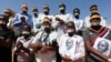Somali journalists, in Mogadishu on Jan. 27, 2013, demand the release of Abdiaziz Abdinur Ibrahim, who was arrested after reporting on an alleged rape case involving government soldiers. 