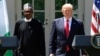 President Donald Trump and Nigerian President Muhammadu Buhari arrive for a news conference in the White House Rose Garden in Washington, April 30, 2018. 