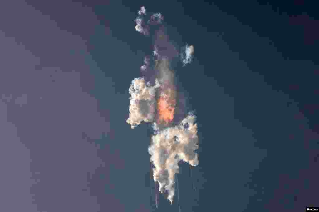 SpaceX's next-generation Starship spacecraft, atop its powerful Super Heavy rocket, explodes after its launch from the company's Boca Chica launchpad on a brief uncrewed test flight near Brownsville, Texas. 