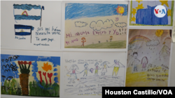 Dibujos realizados por hijos de presos políticos en Nicaragua, muchos de ellos con más de un año de no ver a sus padres. Las imágenes fueron expuestas en la Asamblea Legislativa de Costa Rica. Foto Houston Castillo, VOA.