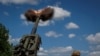 FILE - An M777 Howitzer is fired during action in the Donetsk region of Ukraine, June 6, 2022. The Pentagon said Aug. 25, 2022, that M77 artillery was among the weaponry used in attacks on Iranian-backed militants in northeast Syria.