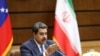 El presidente de Venezuela, Nicolás Maduro, habla durante una reunión con el presidente iraní, Ebrahim Raisi (no aparece en la foto), en Teherán, Irán, el 12 de junio de 2022.