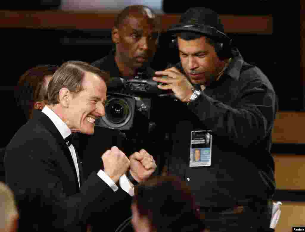 Actor Bryan Cranston reacts as he takes the stage after "Breaking Bad" was named Outstanding Drama Series during the 66th Primetime Emmy Awards in Los Angeles, Aug. 25, 2014.